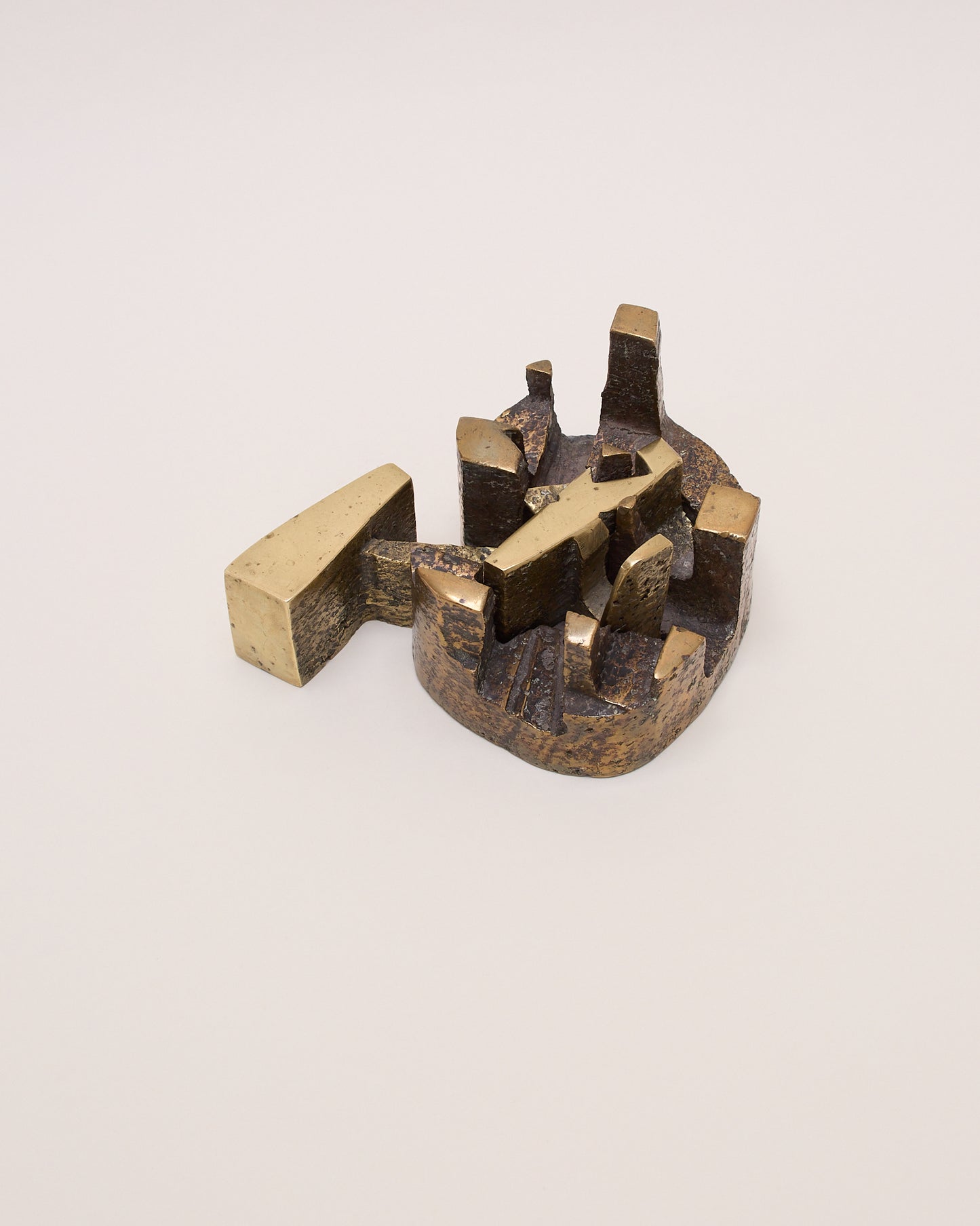 Interlocking Christian Lymann Hansen sculpture (c.1970) — stacked bronze forms with contrasting texture.