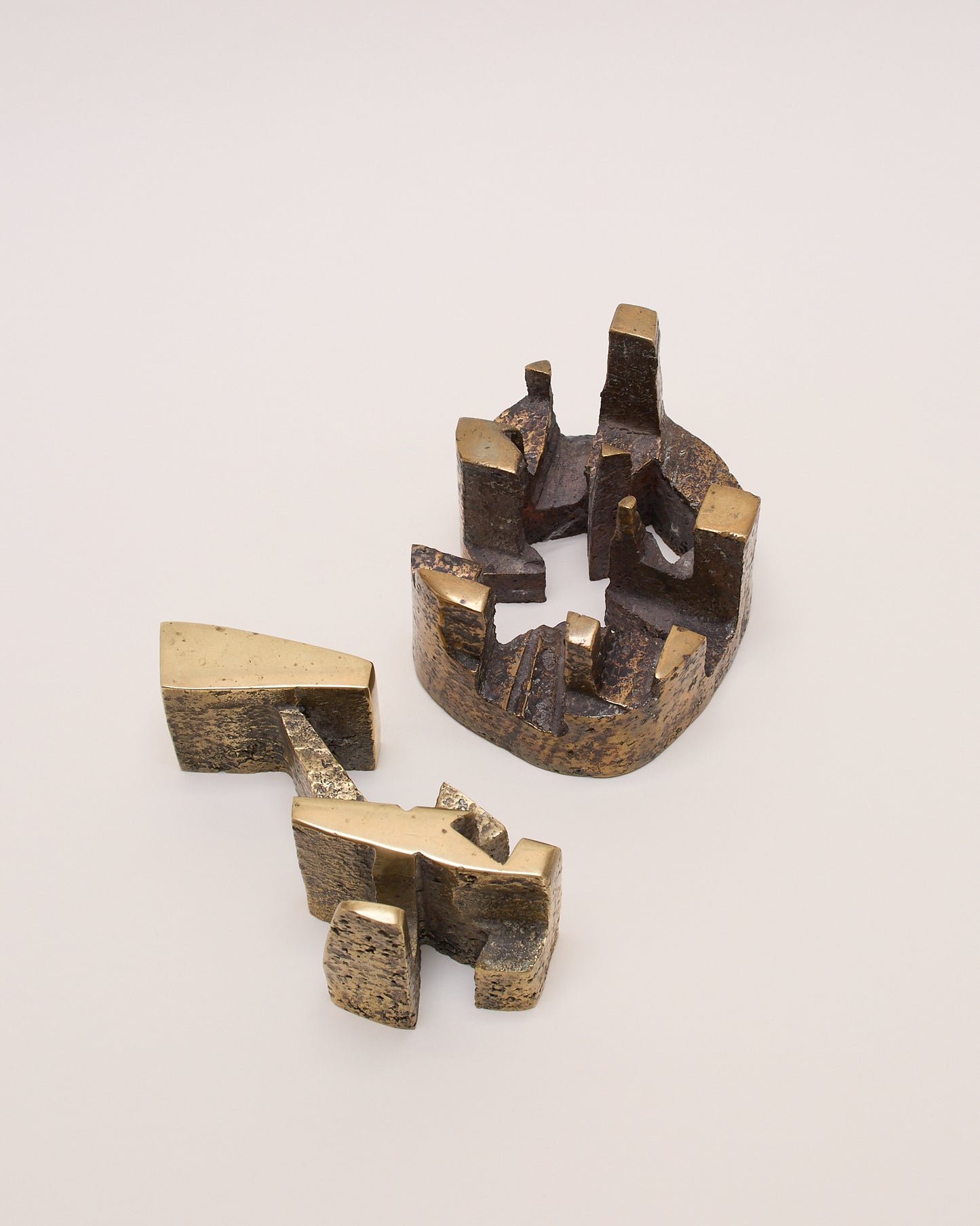 Top view of Christian Lymann Hansen bronze sculpture (c.1970) — separated two-part geometric forms.