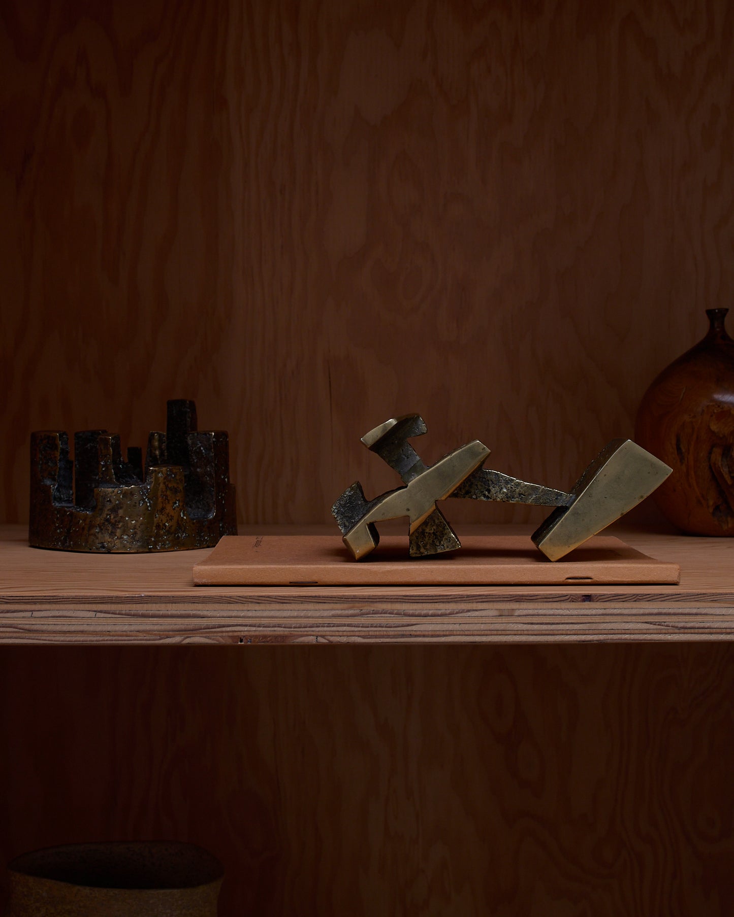 Bronze sculpture by Christian Lymann Hansen (c.1970) — displayed on shelf with open composition.