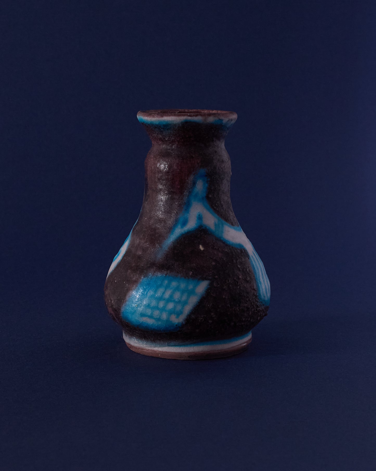 Side view of Guido Gambone ceramic vase (c.1940s) — textured glaze and abstract detailing.