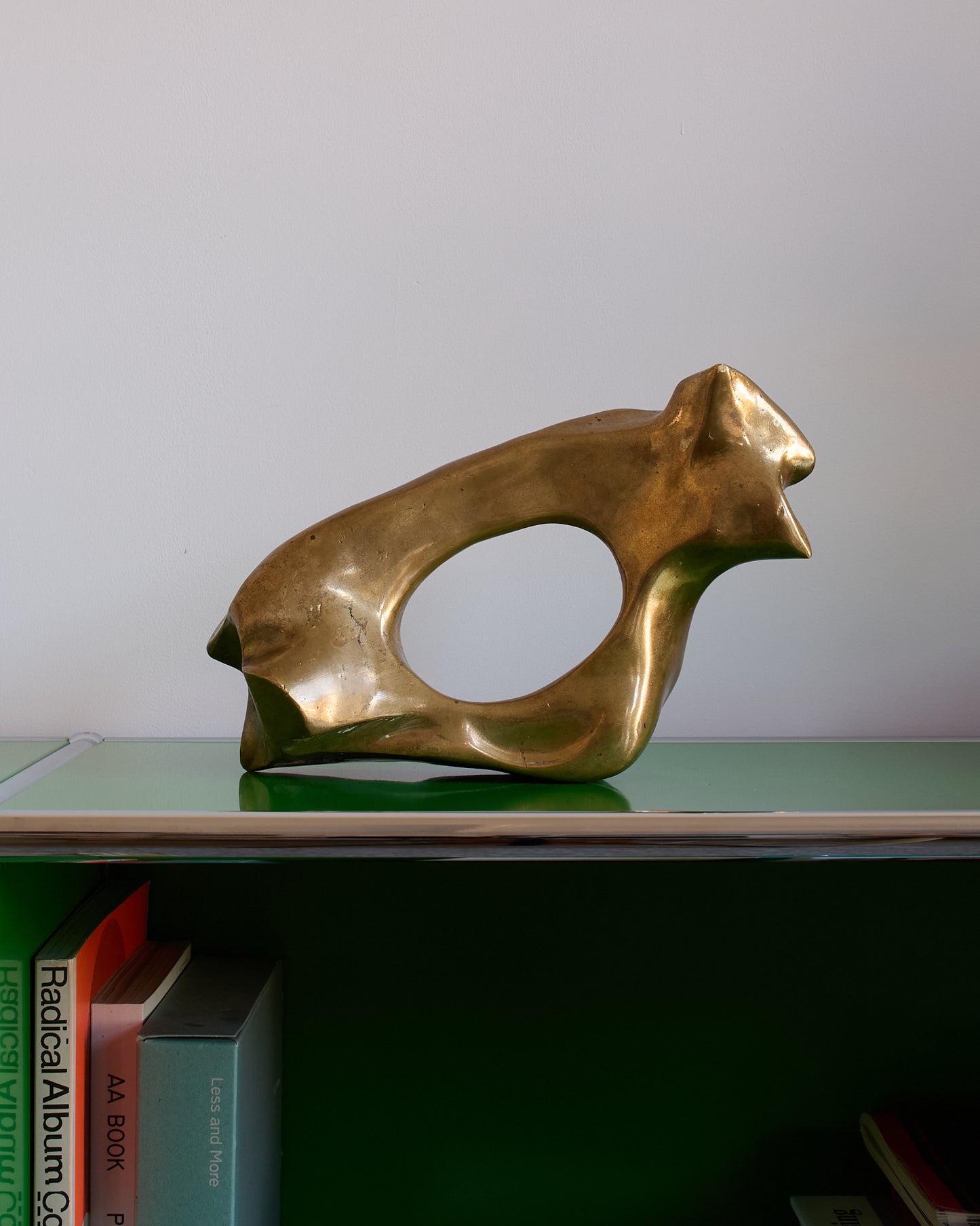 Interior view of James Mercurin bronze sculpture (c.1990s) — displayed on shelf.