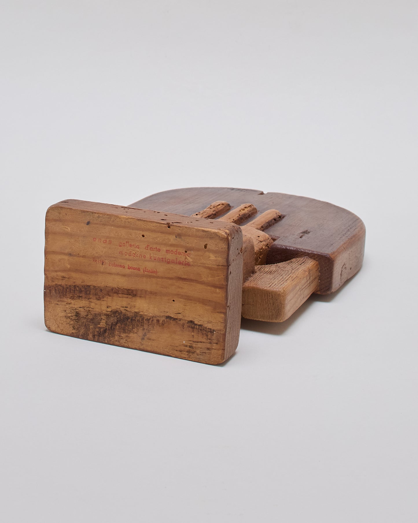 Base of Adolf Vallazza sculpture (1977) — stamped with Galleria d'Arte Moderna and signed.