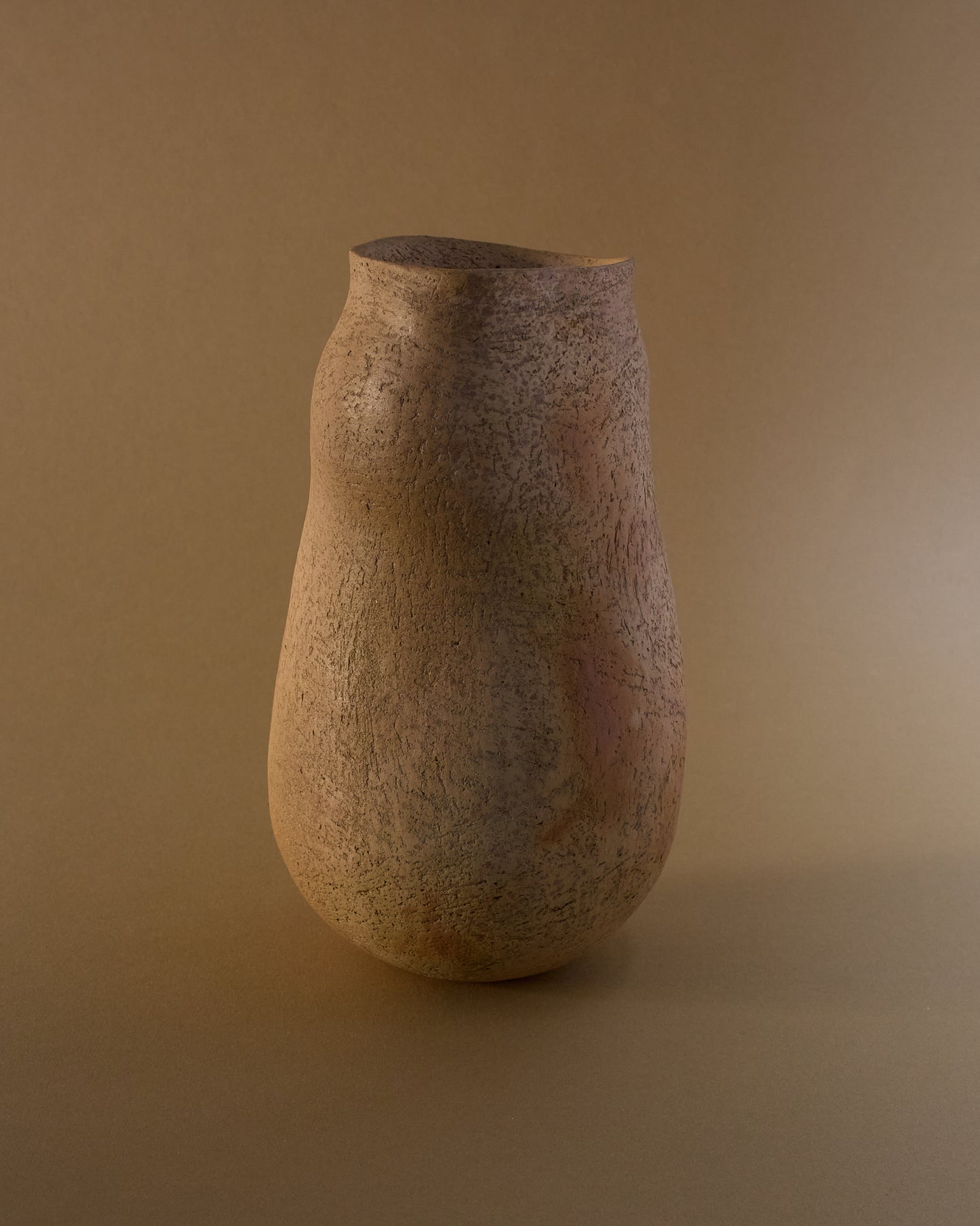 Opposite side view of Elspeth Owen ceramic vase (c.2000s) — hand-built, asymmetrical form with surface variation.