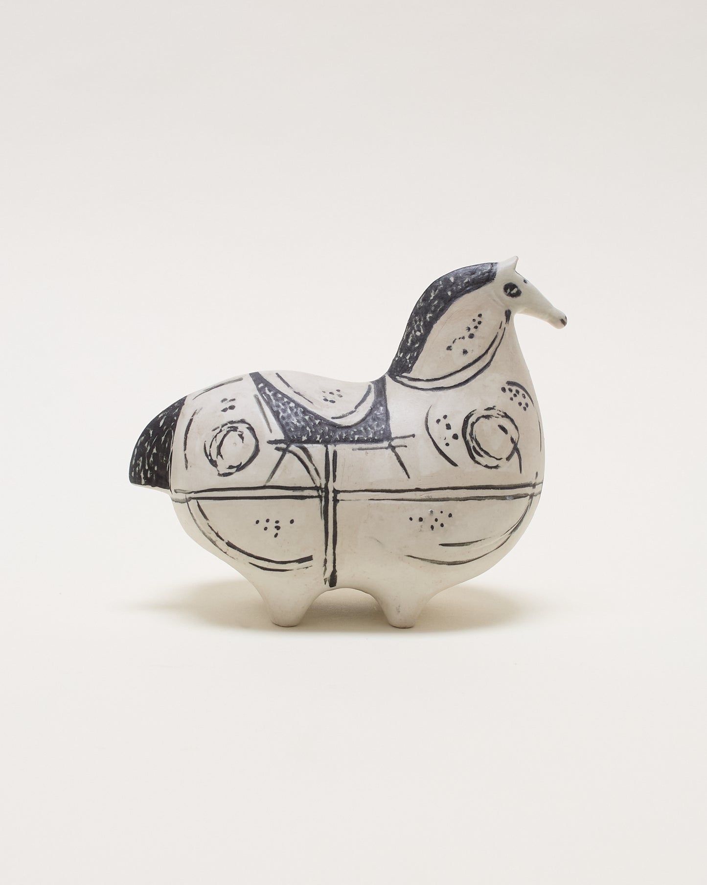 Side view right of Springare ceramic sculpture by Stig Lindberg for Gustavsberg, featuring a stylised horse form, hand-decorated and numbered.