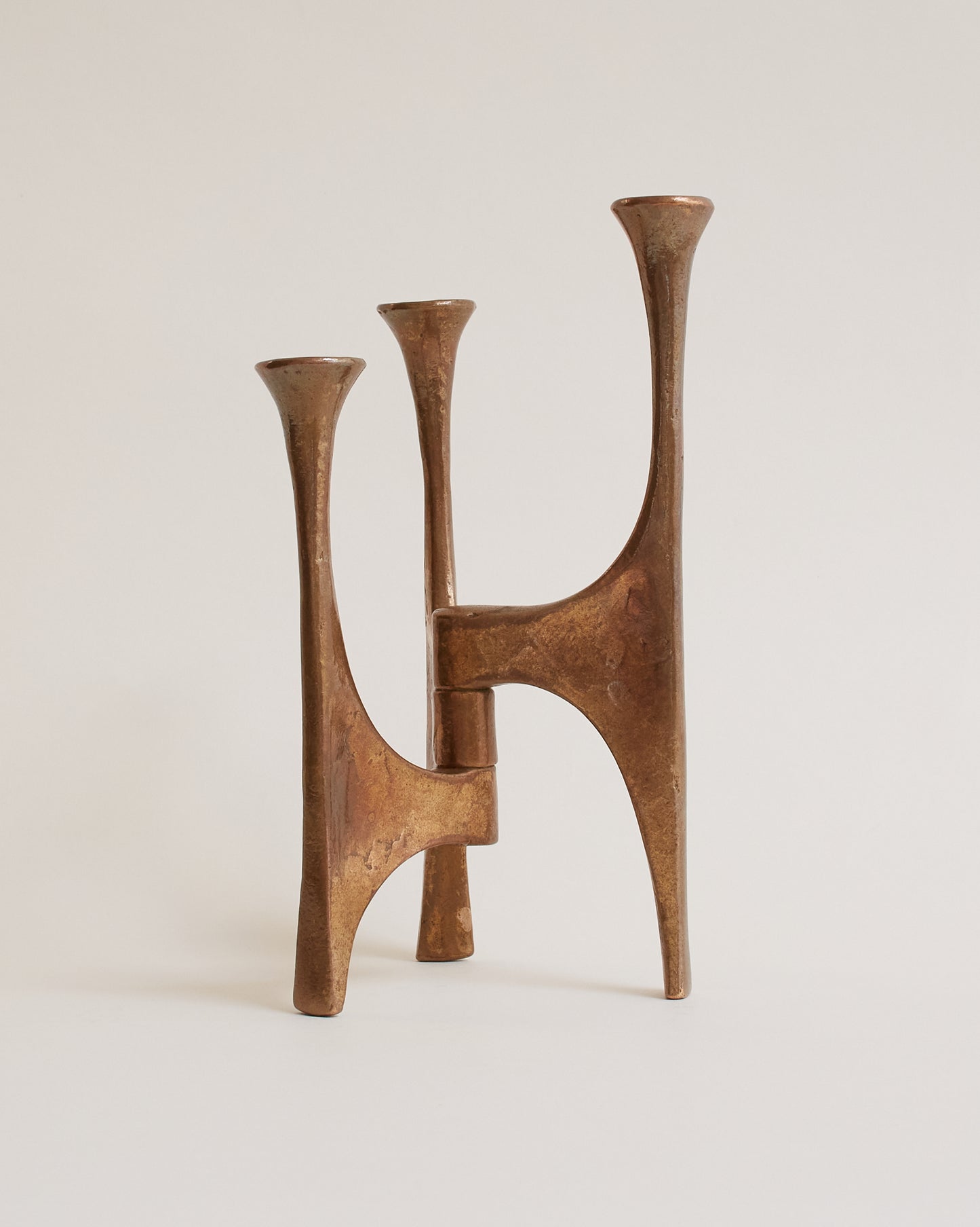 Michael Harjes bronze candle holder, front view. Category — Metal Candle Holders & Sculpture
